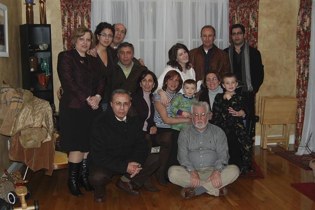 DSC_2151.jpg - The three North American brothers and their families in our MA helping to welcome Rania to the United States!  Top row from left:  Linda, Jennifer, Louis, Mouawad, Nicole, Ossama and Joe.  Bottom row from left:  Tony, Rania, Magaly, Andre, Gampie, Michele and Jonathan.  December 1st, 2007.