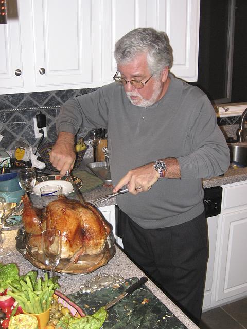 IMG_1674.jpg - Gampie getting ready to carve the turkey!